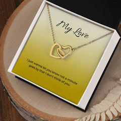 Interlocking Hearts Necklace (Yellow & White Gold Variants)